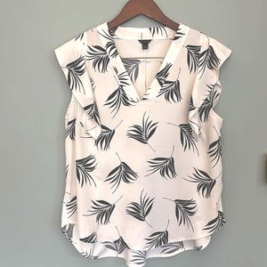 Women’s Ann Taylor blouse with flutter sleeve. Ivory and deep navy. Size M.